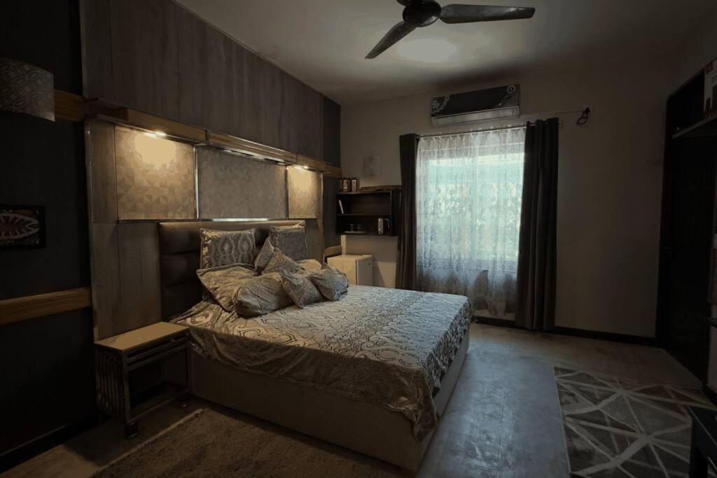 Greenlux Residency ラーワルピンディー 部屋 写真